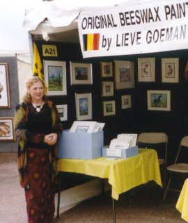Lieve in front of her booth
